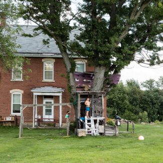 Kids enjoy the family treehouse outside Sherrill, Iowa Kids enjoy the family treehouse outside Sherrill, Iowa