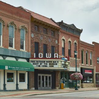 The Iowa Theatre, in Winterset, Iowa, opened as a vaudeville theatre in 1900 and it later screened silent films and by 1931 was showing talkies