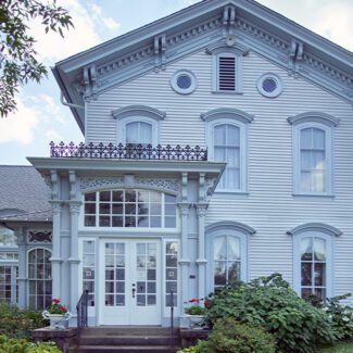 The stately home of the Cedar Falls Woman's Club in Cedar Falls, Iowa John Wayne's four-room birthplace home on John Wayne Drive in Winterset, Iowa, was built in the 1880s
